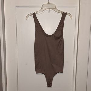 Skims body suit. Never worn